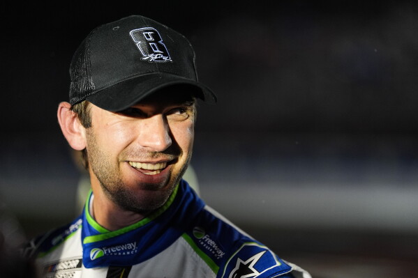 Daniel Suarez Triumphs in Rain-Shortened Coca-Cola 600, Honoring Late Kyle Busch