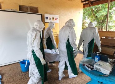 Challenges in Combating Ebola: Porous Borders, Misinformation, and Aid Reductions