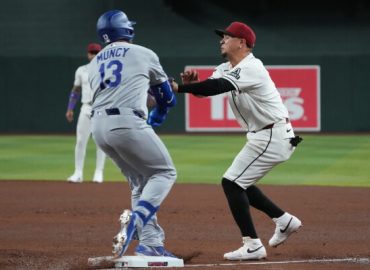 Dramatic Collision on the Field: Vargas and Muncy Injured in Baseball Game