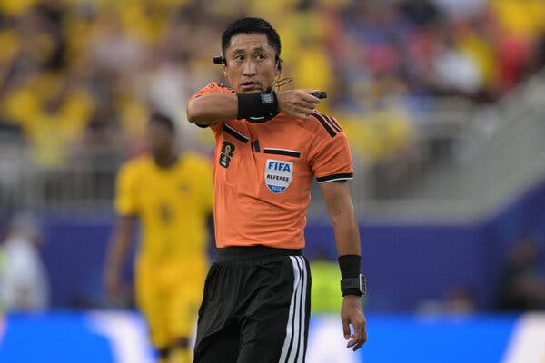 Chinese Referee Ma Ning Shines at World Cup