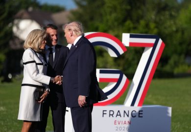 Trump’s Firm Handshake with Brigitte Macron at G7