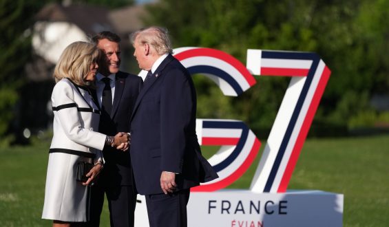 Trump’s Firm Handshake with Brigitte Macron at G7