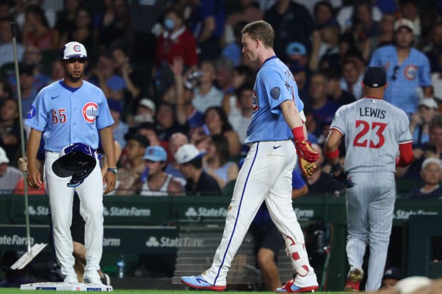 Cubs Shortstop Swanson Takes Ball to Face During Game Against Twins