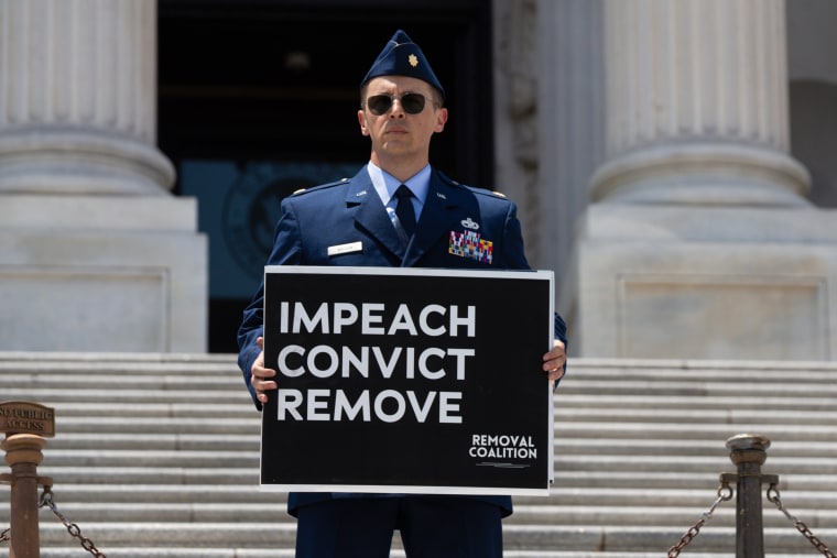 Air Force Major Arrested During Impeachment Call on Capitol Steps