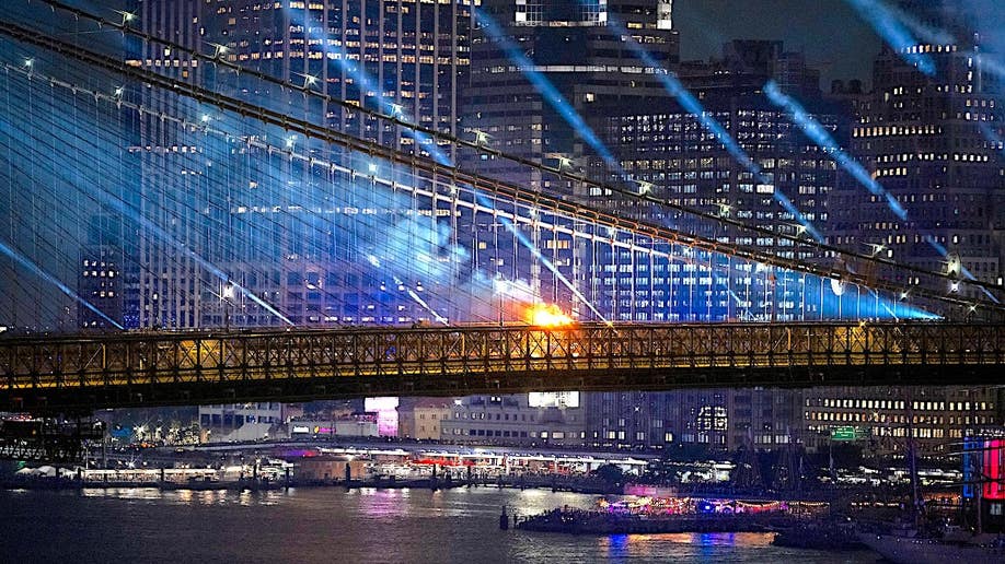 Fire Engulfs Brooklyn Bridge During 250th Independence Day Fireworks
