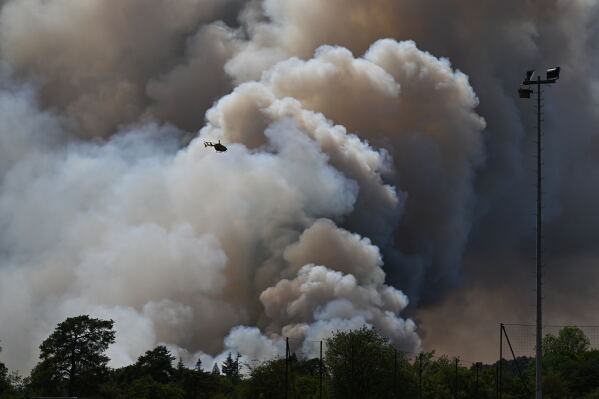 Firefighters Battle Wildfires in France and Spain Amidst Heat Waves