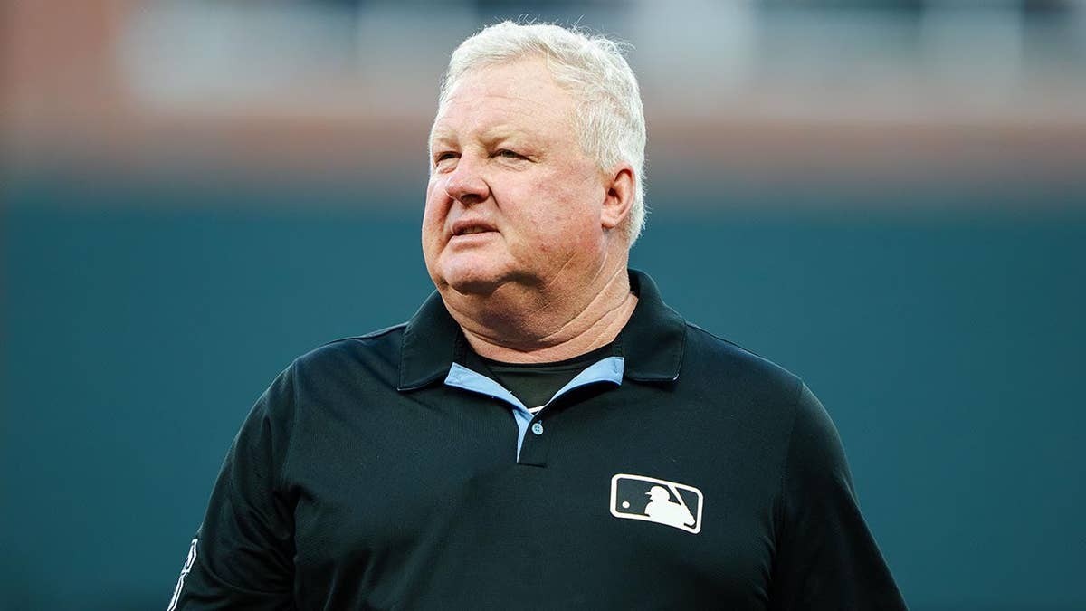 Cincinnati Reds Triumph Over Chicago Cubs Amid Umpiring Controversy