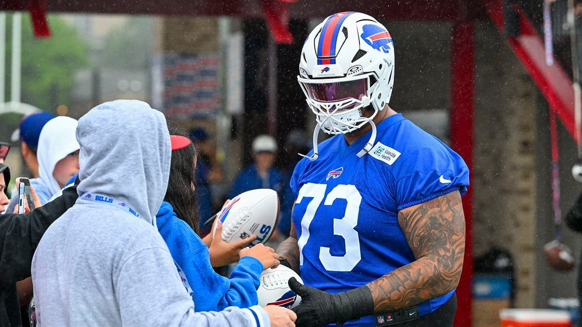 The Debate Over Dogs on NFL Practice Fields