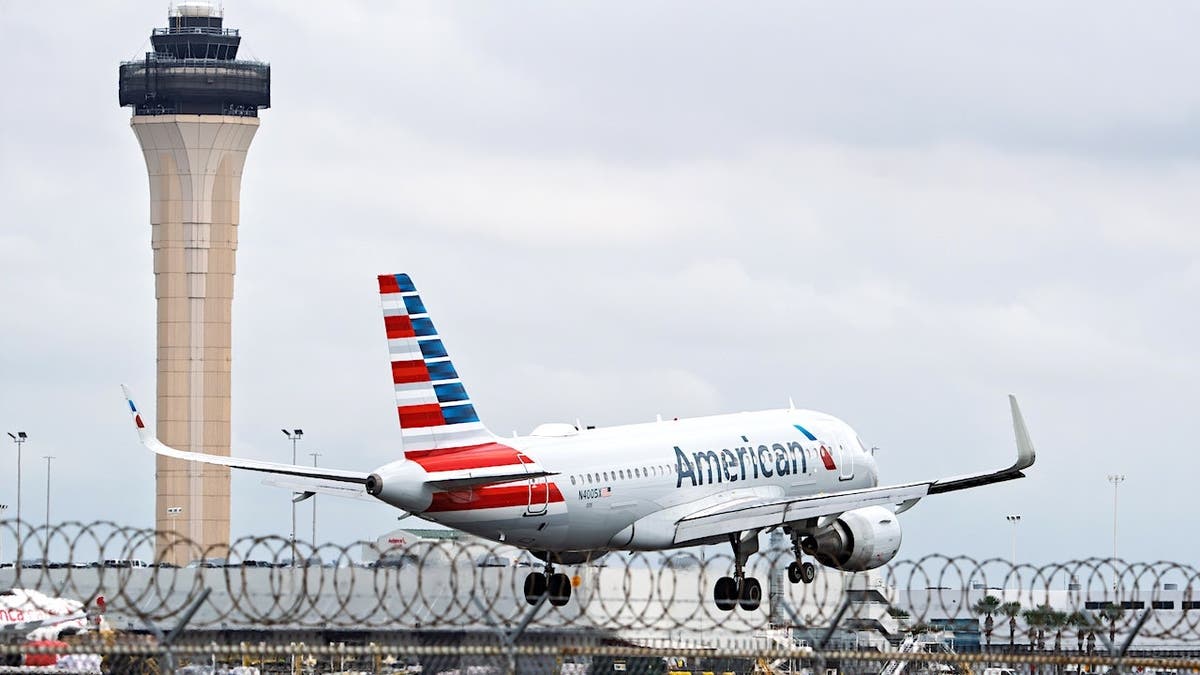 Incident on American Airlines Flight: Unruly Passenger Taken into Custody