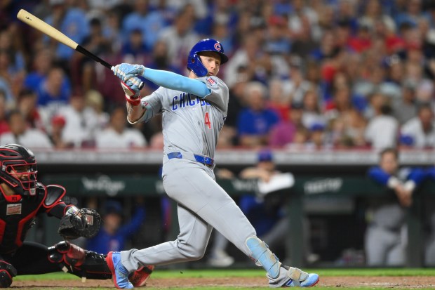 Cubs Fall Short Against Reds as Key Opportunities Slip Away