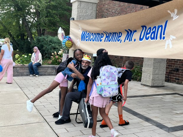 Celebration as Beloved Custodian Returns to Scott Elementary