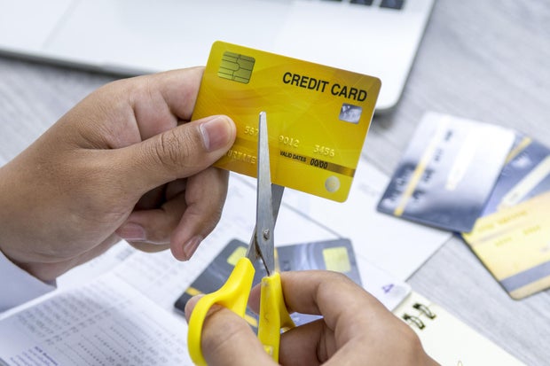 Understanding the Pros and Cons of Settling Charged-Off Credit Card Debt