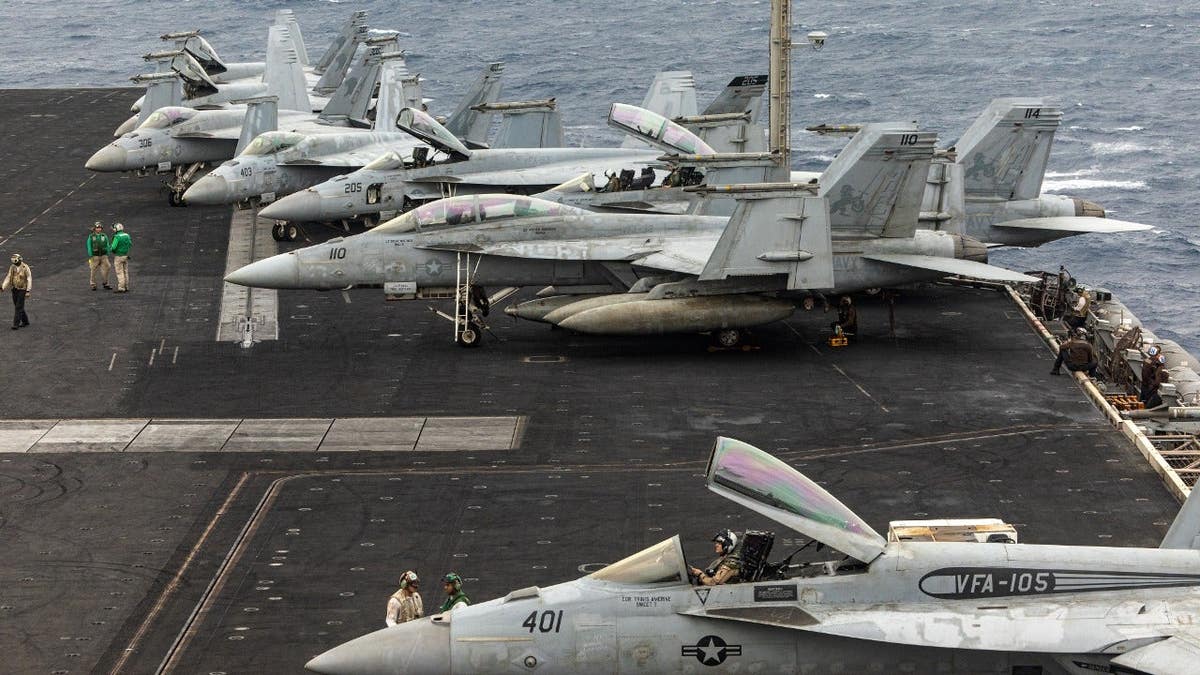 Navy Aviators Eject Safely Amid Mishap on USS Dwight D. Eisenhower
