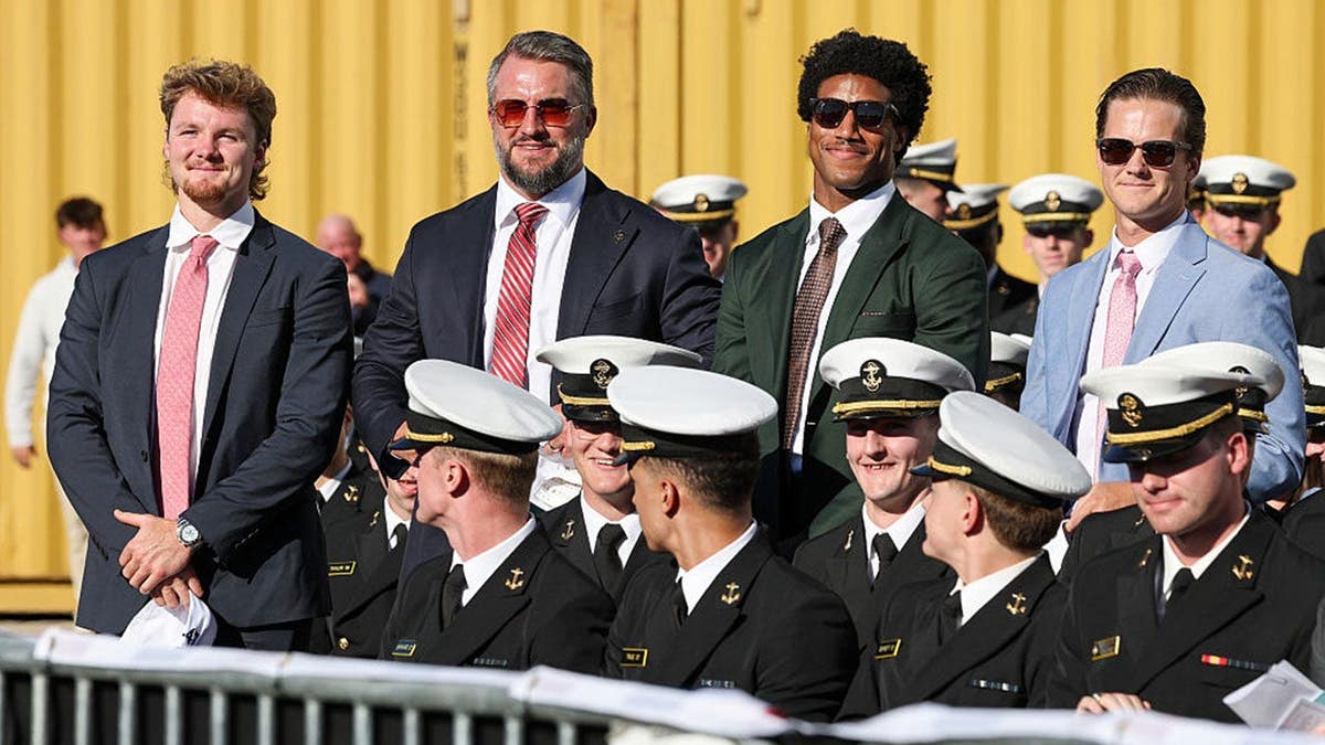 Trump Interacts with Ravens Players at Shipyard Event
