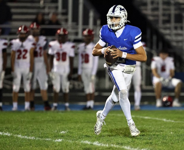 Burlington Central’s Quarterback Reece Beemer Shows Skills Amid Ground Game Focus